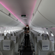 An employee of airBaltic walks inside an aircraft at Delhi’s Indira Gandhi International Airport.